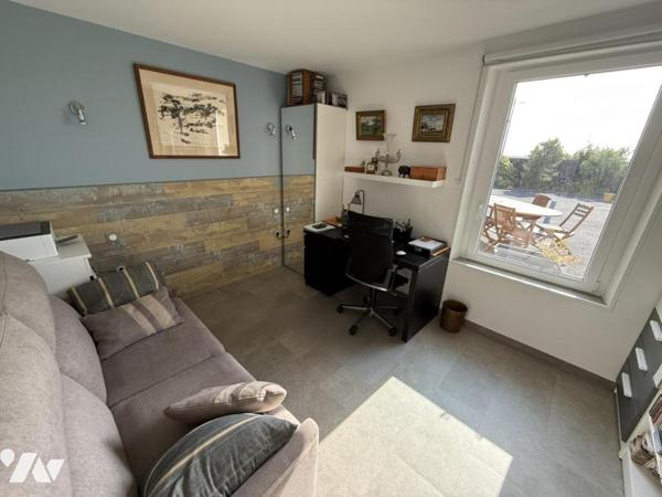 Maison de plain-pied dans le bourg de Portbail