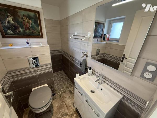 Maison de plain-pied dans le bourg de Portbail