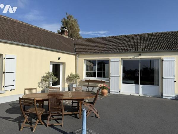 Maison de plain-pied dans le bourg de Portbail