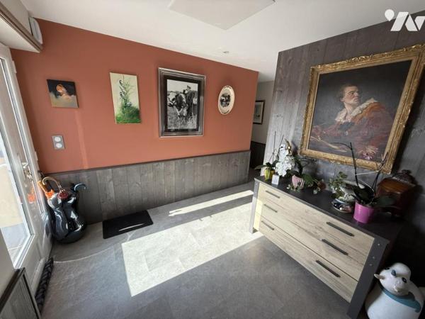 Maison de plain-pied dans le bourg de Portbail