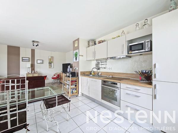 ST LAURENT DE MURE Centre - Appartement 4 pièces de 81,31m² avec terrasse et garage double