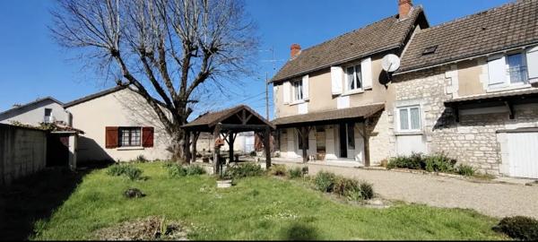 Ensemble immobilier avec double accès et beau potentiel d'am