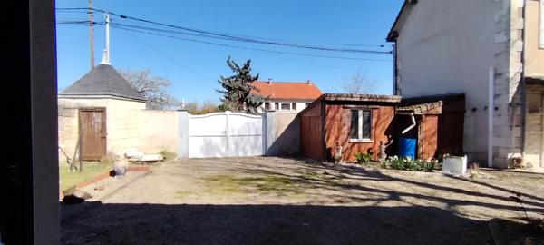 Ensemble immobilier avec double accès et beau potentiel d'am