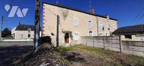 Immeuble de rapport de deux logements avec jardin chacun