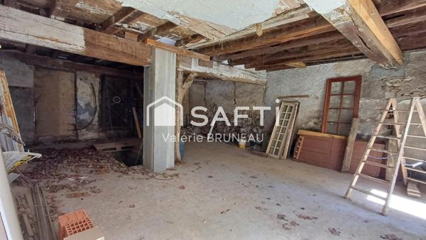 BATISSE A RENOVER DE 460 M2 AU CENTRE VILLAGE