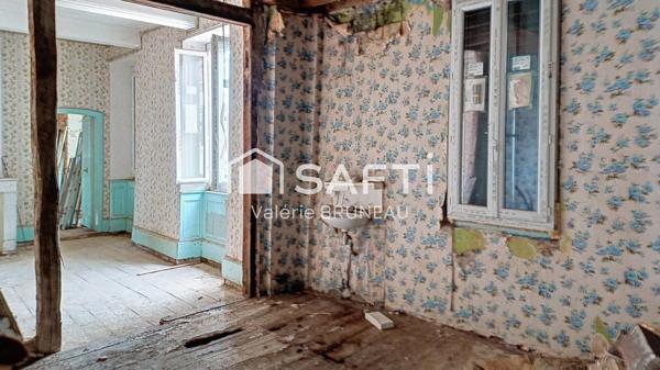 BATISSE A RENOVER DE 460 M2 AU CENTRE VILLAGE