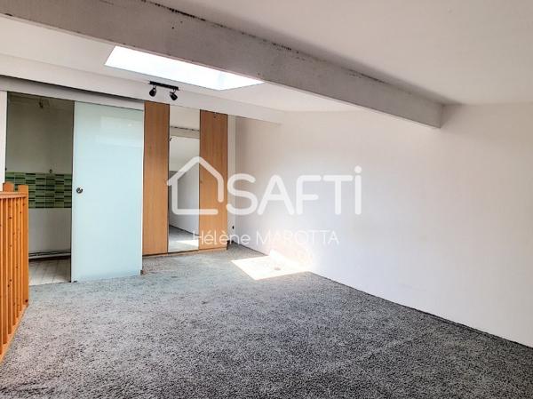 Centre ville - F1 en Duplex avec stationnement privatif