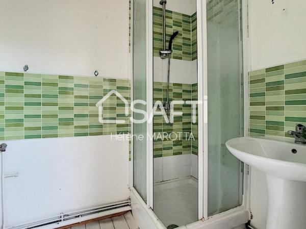 Centre ville - F1 en Duplex avec stationnement privatif