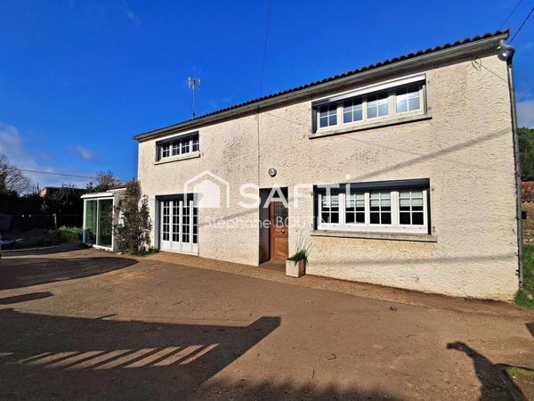 Maison 157 m² - 2  chambres - Garage - Terrain 567 m² clos.