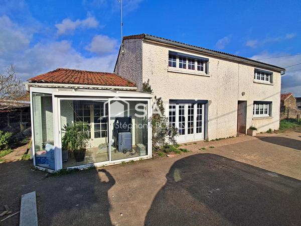 Maison 157 m² - 2  chambres - Garage - Terrain 567 m² clos.