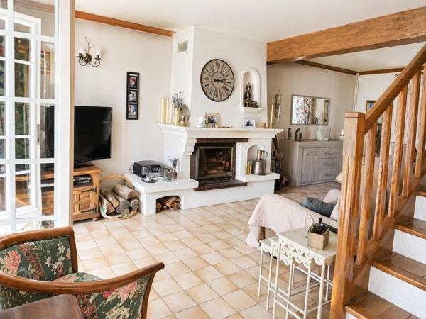 Maison lumineuse avec grand jardin et véranda