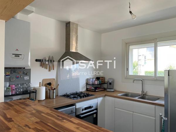 Maison mitoyenne de 68 m2 avec garage et jardin