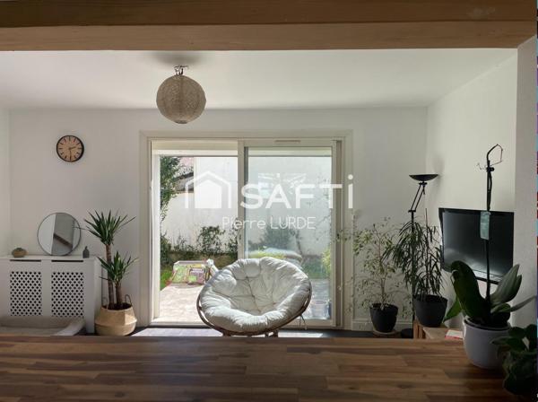 Maison mitoyenne de 68 m2 avec garage et jardin