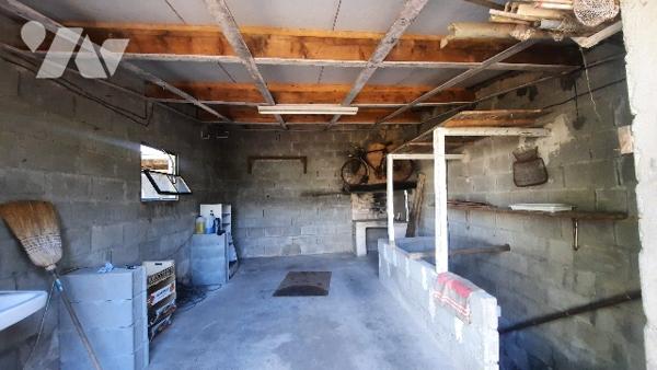 Buzançais (36) maison de ville, cuisine, séjour, trois chambres. Avec jardin et garage