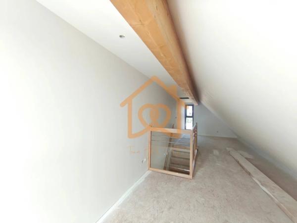 À Geispolsheim Village : Appartement avec garage, parking et un are de terrain