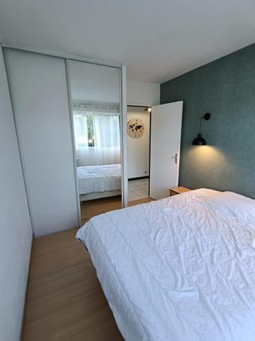 Laxou – Appartement 2 pièces avec balcon, cave et parking souterrain