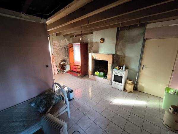 maison en pierre avec un beau potentiel