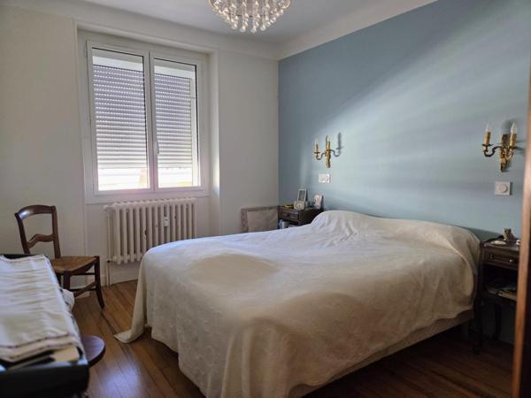 Bel appartement lumineux au calme avec balcon, jardin, caves et garage à proximité des commodités