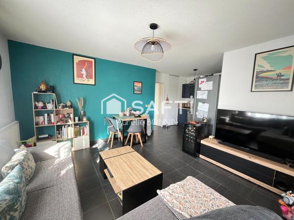 Appartement 3 pièces dans résidence récente proche des commerces +1 emplacement de parking couvert