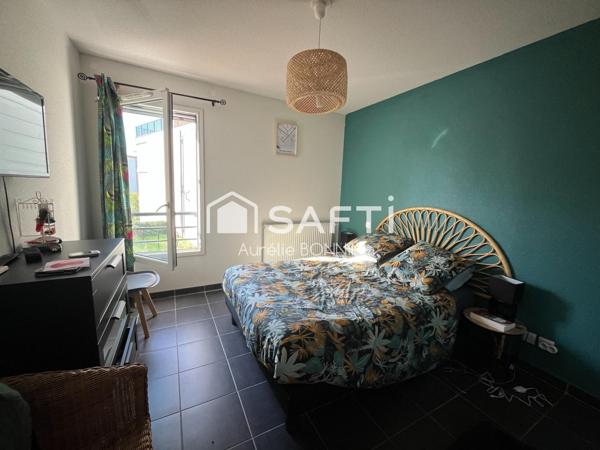 Appartement 3 pièces dans résidence récente proche des commerces +1 emplacement de parking couvert