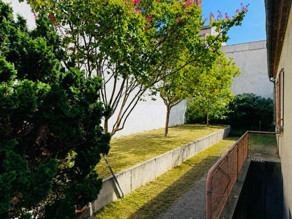Maison de ville avec jardin et garage