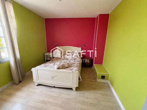 Maison familiale 4 chambres avec dépendances et potentiel à Vivonne