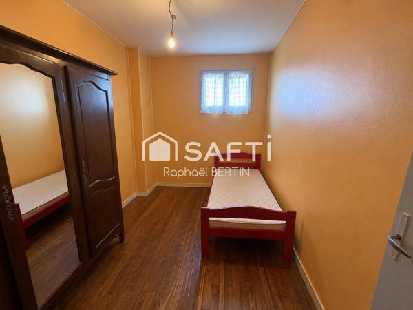 Maison familiale 4 chambres avec dépendances et potentiel à Vivonne