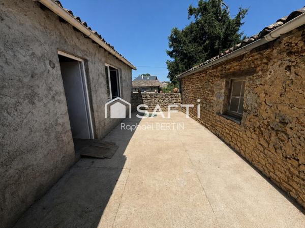 Maison familiale 4 chambres avec dépendances et potentiel à Vivonne