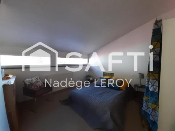 Lot de 5 appartements, atelier, terrasses.