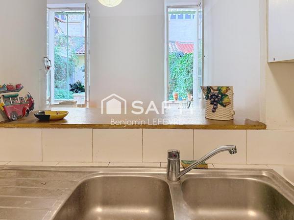 T3 EN RDJ FERMÉ AVEC TERRASSE, COUR ET BÂTI EN FOND DE COUR