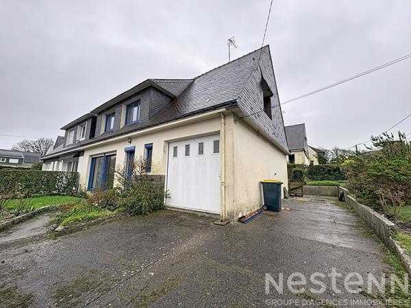 Maison - 123m² - plain-pied - 4 chambres - garage