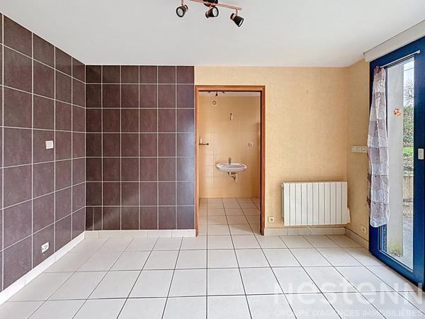 Maison - 123m² - plain-pied - 4 chambres - garage