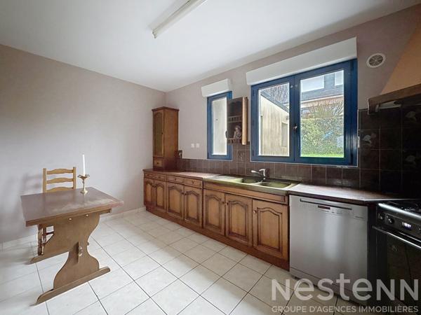 Maison - 123m² - plain-pied - 4 chambres - garage