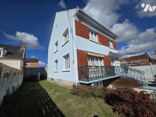 Maison de ville avec sous-sol, 4 chambres et petit jardin