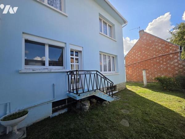 Maison de ville avec sous-sol, 4 chambres et petit jardin