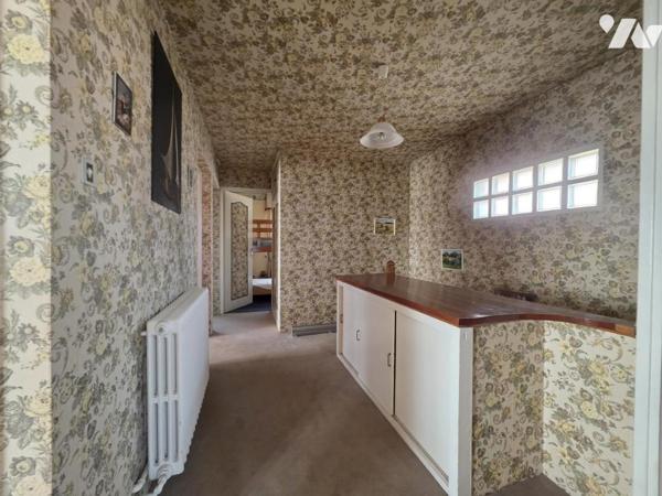 Maison de ville avec sous-sol, 4 chambres et petit jardin