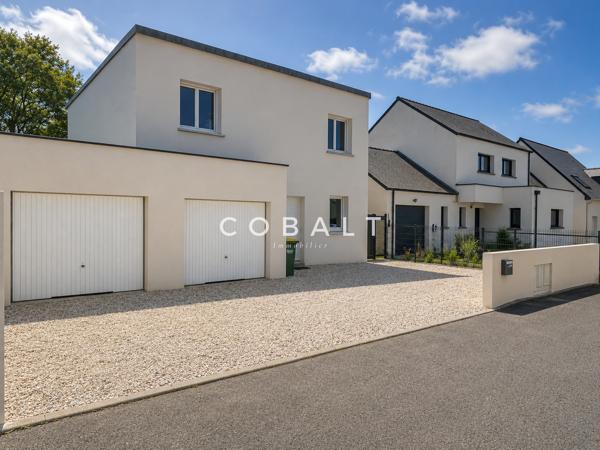 Maison contemporaine de 100 m² avec jardin arboré et double garage