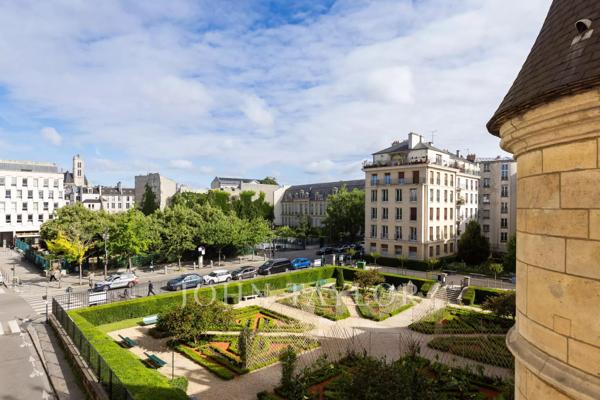 Bel appartement avec vue dégagée sur la Seine et les jardins de l'Hôtel de Sens