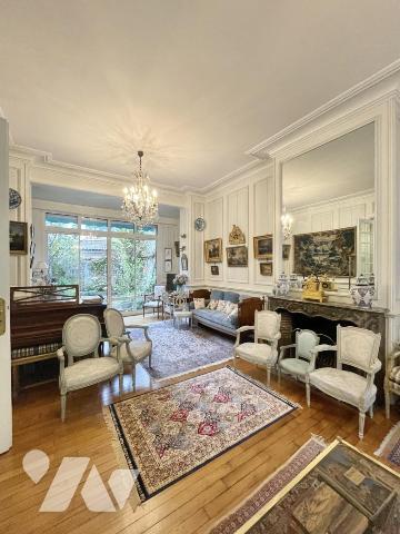 maison 11 pièces avec jardin et garage.