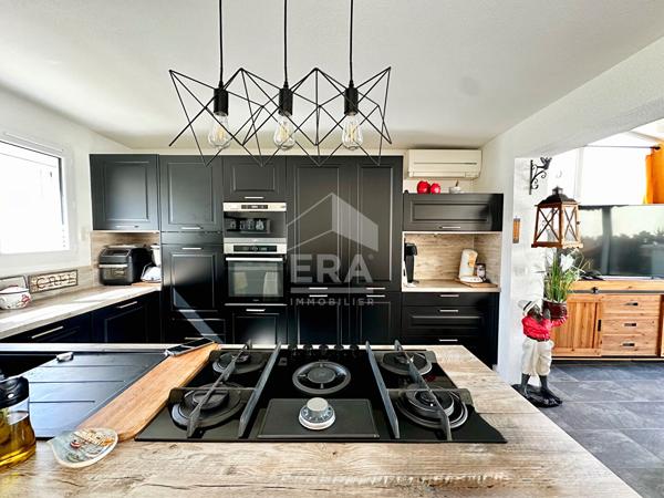 À vendre à Le Barcarès : Maison 106 m2, 3 chambres avec vue sur l'étang
