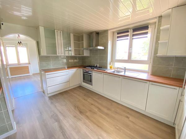Maison cosy 4 pièces à vendre à Bollwiller, quartier calme- beau jardin avec espace terrasse - garage