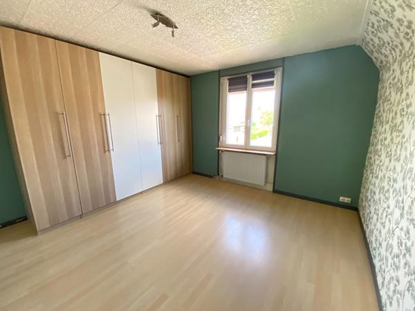 Maison cosy 4 pièces à vendre à Bollwiller, quartier calme- beau jardin avec espace terrasse - garage