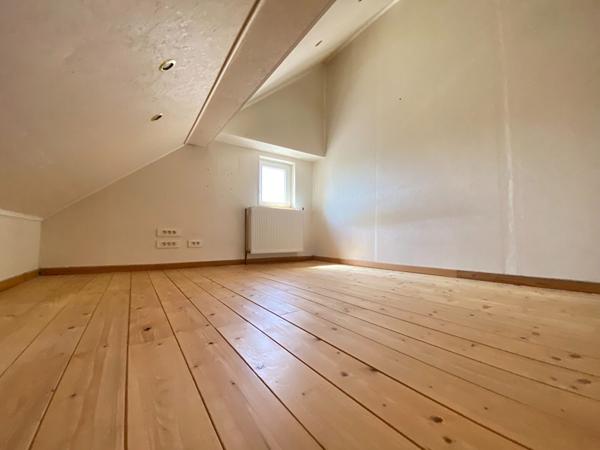 Maison cosy 4 pièces à vendre à Bollwiller, quartier calme- beau jardin avec espace terrasse - garage