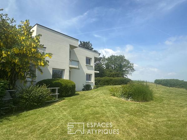 Maison d’architecte contemporaine avec piscine intérieure et vue mer – Yffiniac
