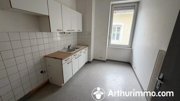 Vente                                                      Immeuble
                        
                                                            à L'Isle-sur-le-Doubs