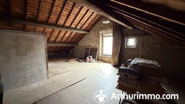 Vente                                                      Immeuble
                        
                                                            à L'Isle-sur-le-Doubs