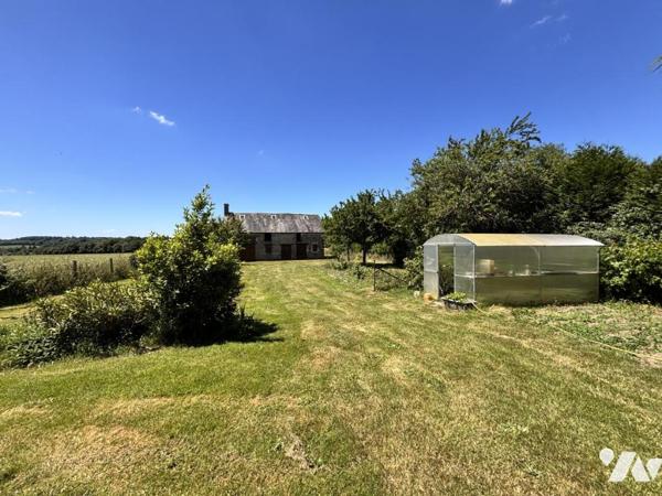 SECTEUR LENAULT - MAISON D'HABITATION EN PIERRE AVEC JARDIN