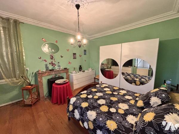 SECTEUR LENAULT - MAISON D'HABITATION EN PIERRE AVEC JARDIN