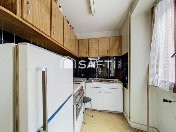 Ensemble immobilier en pierre au cœur de Saint-Félicien
