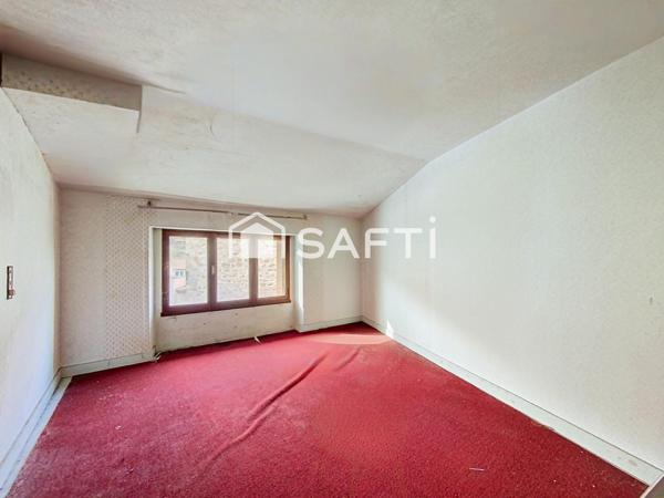 Ensemble immobilier en pierre au cœur de Saint-Félicien